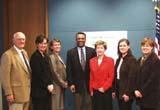 Executive Sims is pictured with the Hooker family; King County purchased the Mitchell Hill property from the Hooker Family Trust for public forestry purposes.